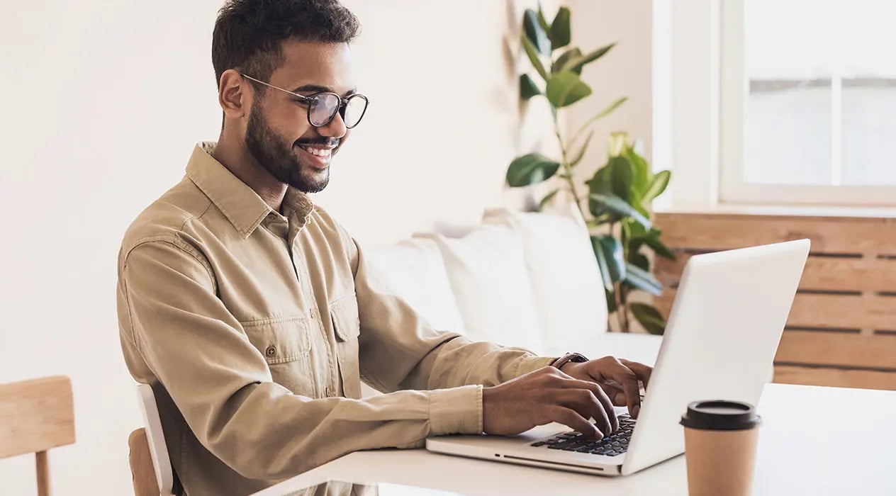 Image of a person with a computer