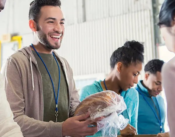 Image of people packing food